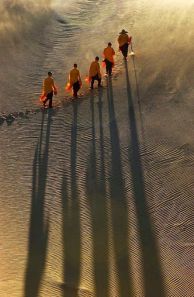 Walking monks on desert